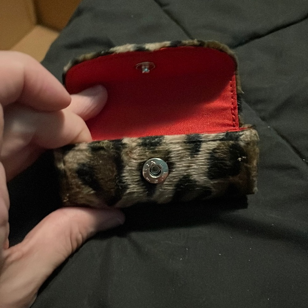Lipstick holder. Cute, leopard print outside and red inside